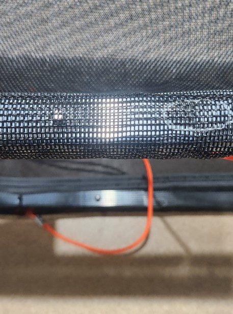 Snap button on the aluminum tubing
