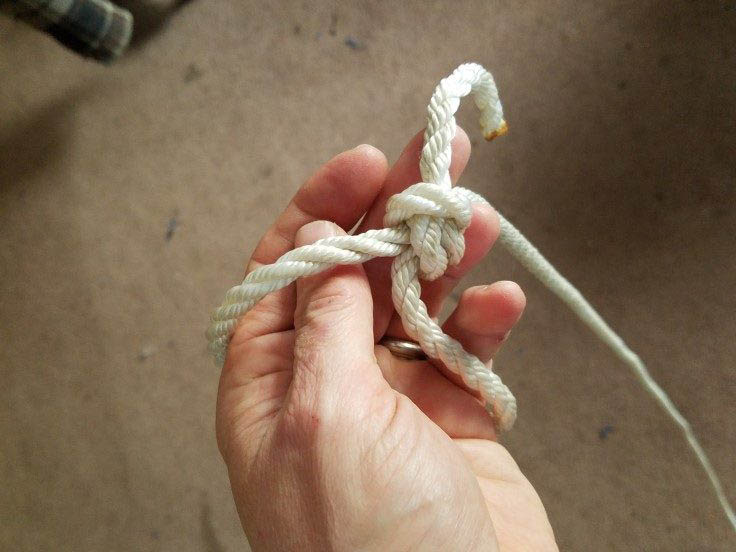 Slip knot loop of the pull rope over a wrist